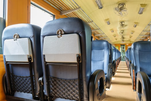 A row of seats on a train photo