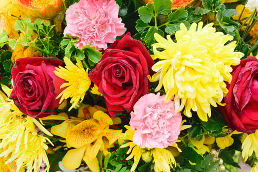 A vase filled with flowers and a vase filled with flowers photo