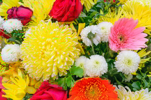 A bunch of flowers in a vase photo