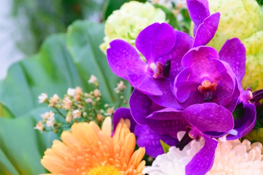 Beautiful purple orchids flower in a bouquet photo