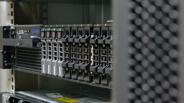 A rack of servers in a data center photo
