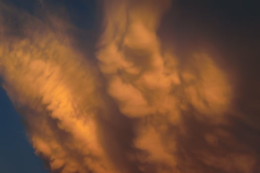 A large cloud is seen in the sky photo