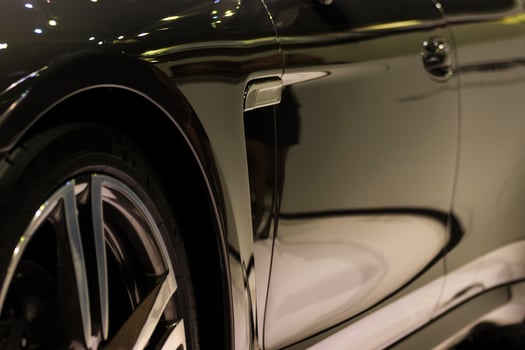 A close up of a shiny black car photo
