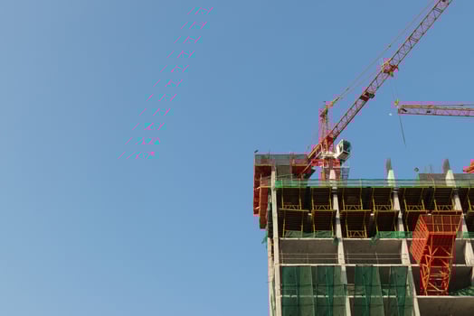 Crane with building construction photo