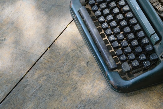 A typewriter sitting on a table photo