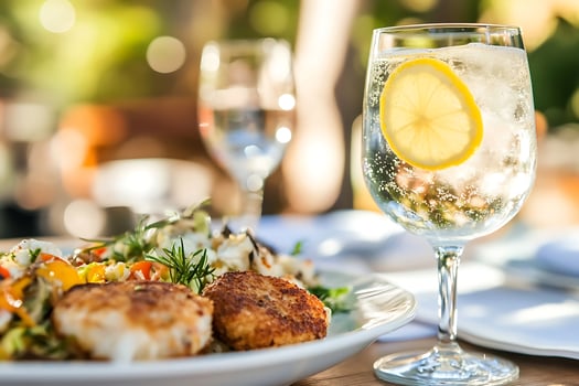 Refreshing Lemon Drink with Delicious Pan Fried Patties Outdoor Dining Experience. photo