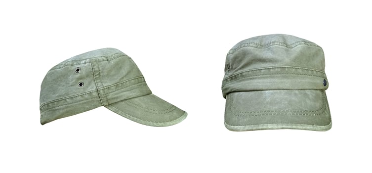 Two green hats, separate on a white background. photo