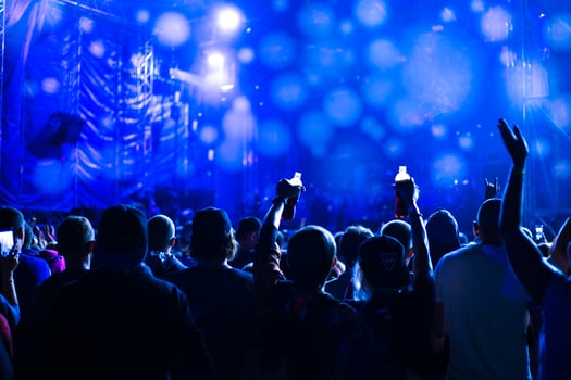 music concert at night on the street, youth dancing and applauding photo
