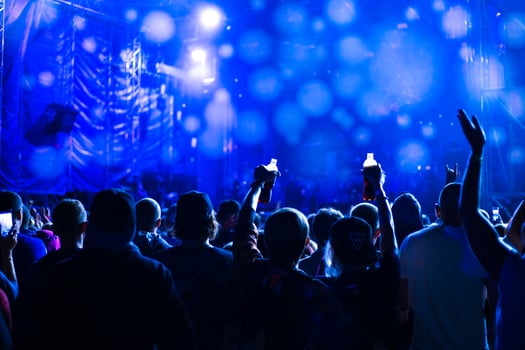 music concert at night on the street, youth dancing and applauding. photo