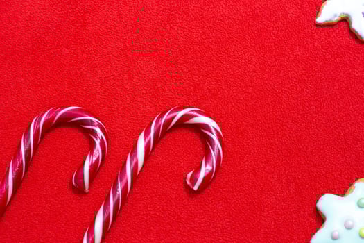 Christmas red fabric background and candy photo