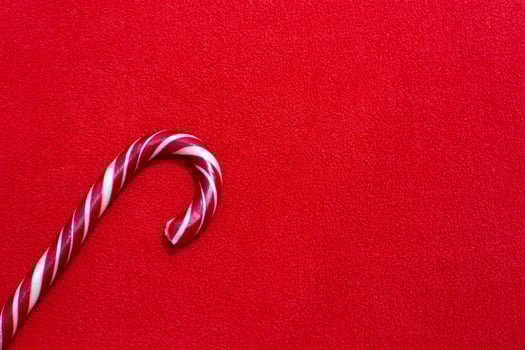 Christmas red fabric background and.candy.. photo