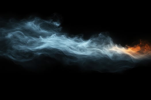 Blue and orange smoke on a black background photo