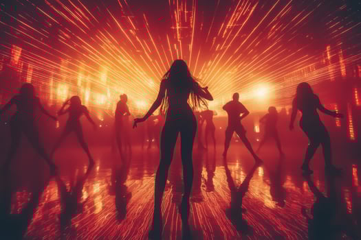 A woman dancing in a nightclub with red lights photo