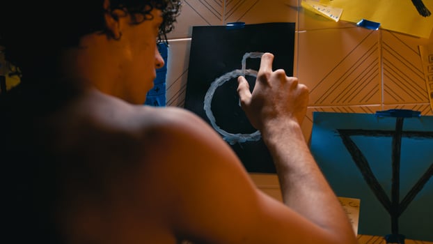 Man tries to decipher strange symbols that appeared on his wall photo
