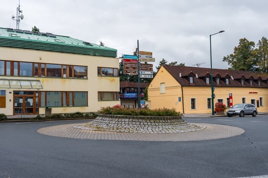 Pruhonice, Czech Republic - October 5, 2024. Roundabout with public buildings and directional signs photo