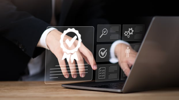 Businessman using laptop digital certificate , symbolizing quality assurance, verification, compliance, online certification ,Ideal for digital standards, approval process, professional credentials photo
