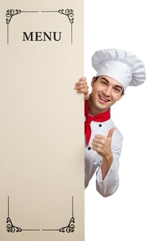 heerful Chef Holding a Big Blank Menu Sign with a Thumbs Up Gesture 2 photo
