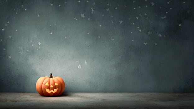 Halloween festive background with glowing orange pumpkin photo