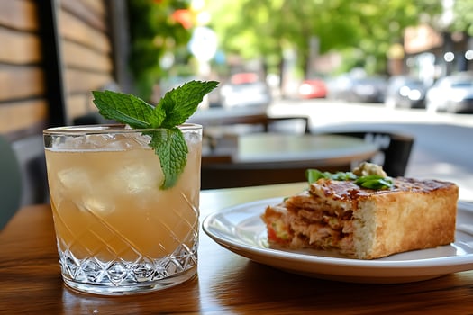 Refreshing Drink and Delicious Pastry Enjoyed Outdoors on a Sunny Day. photo