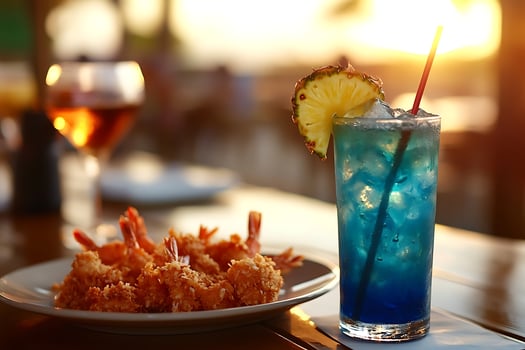 Appetizing Fried Shrimp and Blue Cocktail with Pineapple Slice. photo