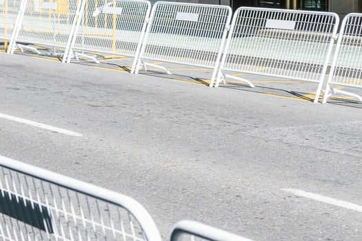 A Row of Metal Fences for a Parade or a Race. Concept The organization of a public event. photo