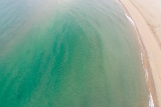 Summer Coastline with Crystal Clear Water and Empty Beach, Minimalist Seascape. photo