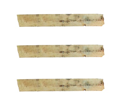 Set of three old stained masking tape strips arranged horizontally on a white background. aged and worn with visible marks and discoloration photo