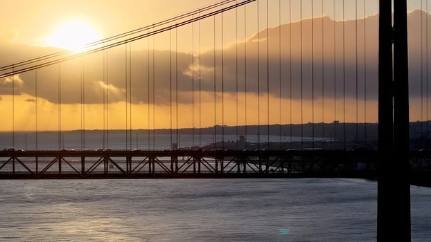 Incredible 25 of April Bridge at Lisbon in Lisbon District Portugal. Amazing Cinematic. photo