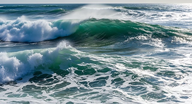 A large wave is breaking on the ocean photo