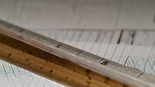 Close-up of Rulers on Graph Paper for Measurement photo