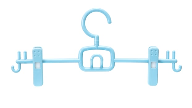 Blue plastic clothes hanger with clips and hooks isolated on white background, suitable for garment hanging. photo