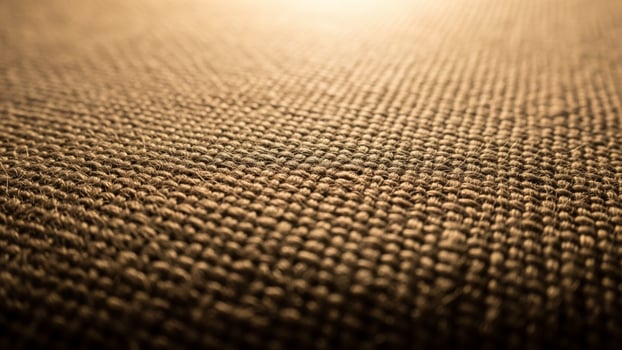 A close up of a brown fabric background photo