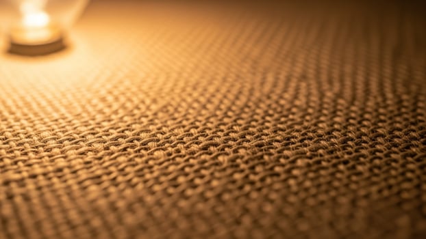 A light bulb is on top of a table photo