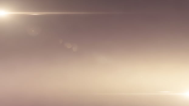 A bright light shines through the foggy sky photo