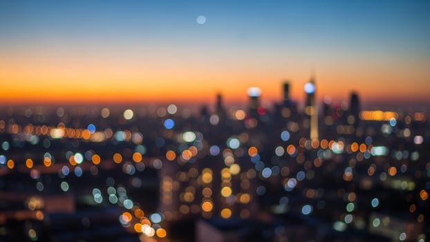 City lights at dusk, blurry bokeh effect photo