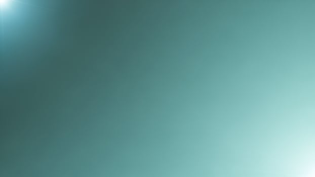 A blue light is shining on a green background photo