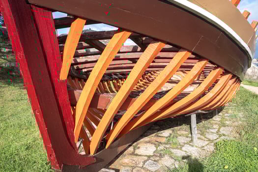 Partial View of a Traditional Boat on Land, Historical Vessel. photo