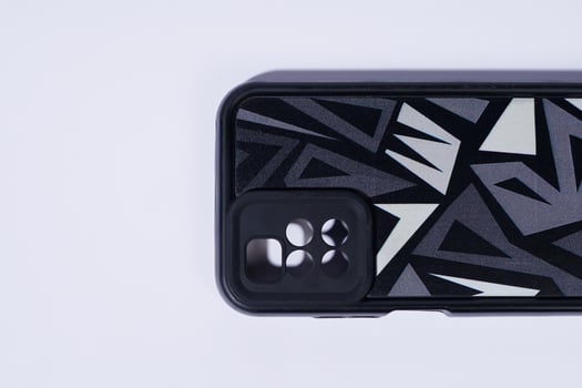 Close-up of a Phone Case with Abstract Pattern on White Background photo