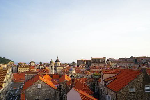 Aerial architecture and decoration design of Dubrovnik old town city walls and landscape with clear blue sky, southern Croatia fronting the Adriatic sea encircled with massive stone photo