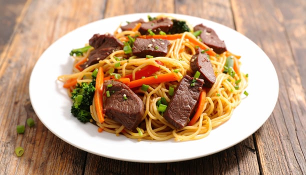 Beef noodles with fresh vegetables photo