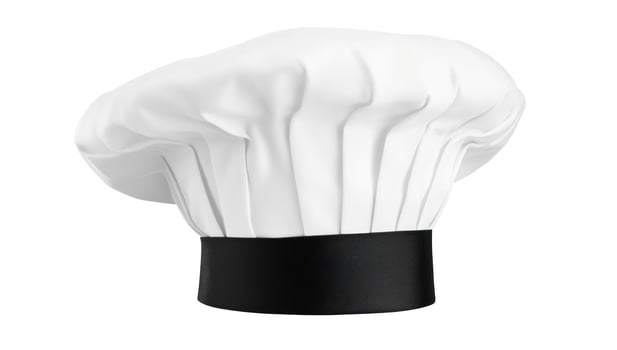 A chef hat is shown on a white background photo