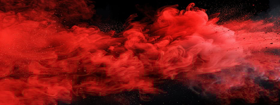 A red cloud of smoke with a black background photo