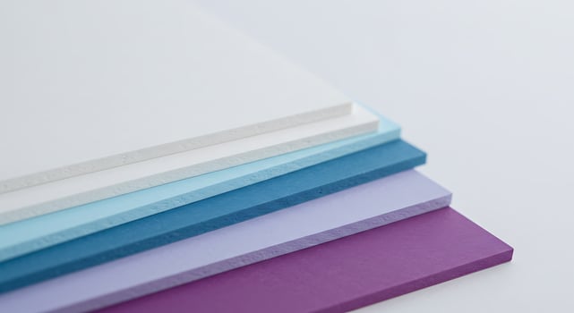Minimalist Stack of Textured Boards in a Cool Blue and Purple Color Gradient photo