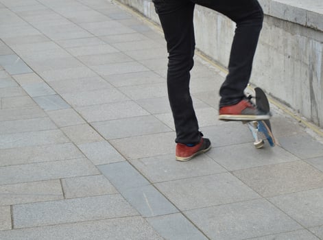 skateboard, a man riding and making stunts photo