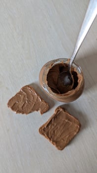 Indulge in Delicious Chocolate Spread served with Toasted Slices for an amazing taste experience photo