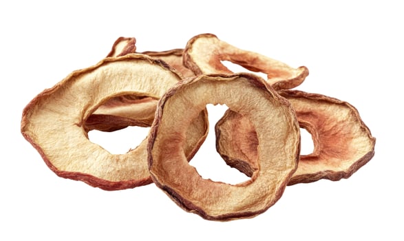 Pile of Dried Apple Rings on White Background, Close-Up View photo