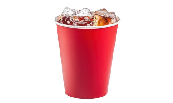 Refreshing Drink Red Paper Cup Filled with Ice and Beverage on White Background photo