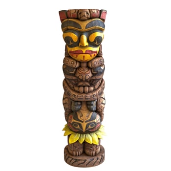 Vibrant carved wooden totem pole featuring traditional Indigenous art and stacked figures on white. photo