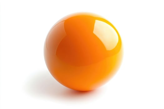 A single shiny orange ball isolated on a white background photo