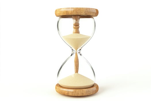 Wooden hourglass with sand isolated on white background photo